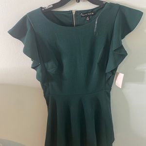 tight green shirt sleeve dress with ruffles